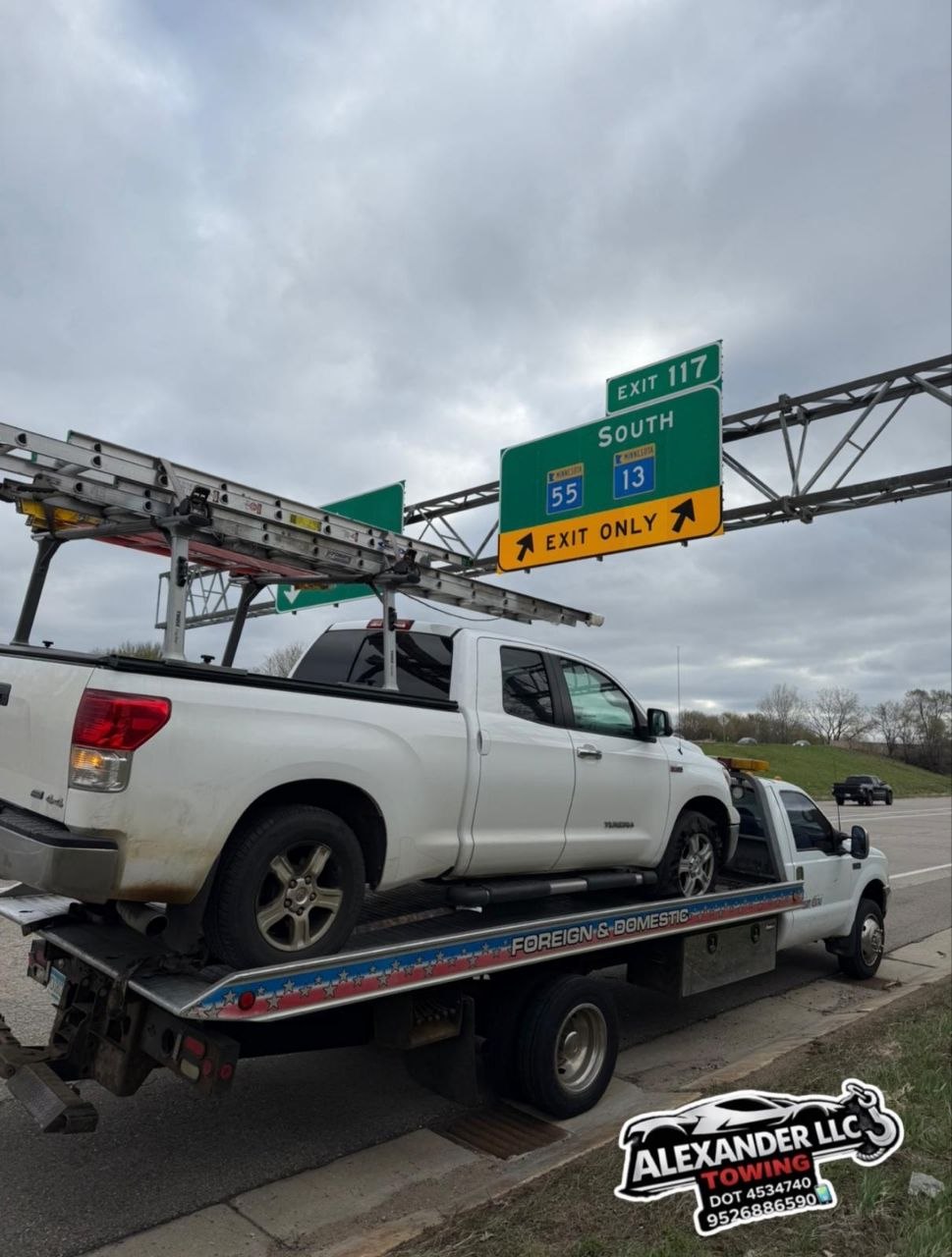 Alexander LLC Towing truck on highway