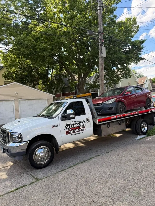 Collision damage vehicle towing Minnesota