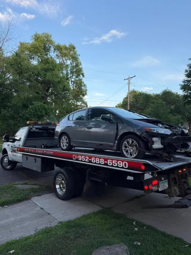 Vehicle damage recovery towing Minnesota