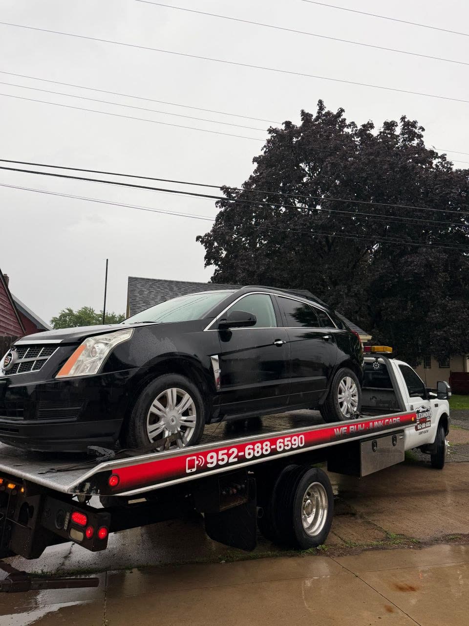 Remolque en plataforma de SUV Cadillac en Minnesota