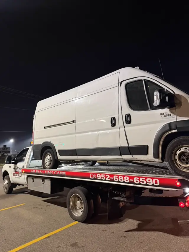Cargo van towing at night in Minnesota