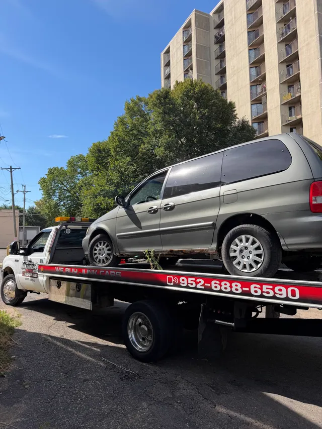 Minivan towed from an apartment building in the Twin Cities