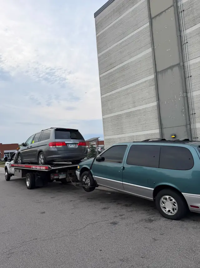 SUV and minivan picked up at an apartment building in the Twin Cities